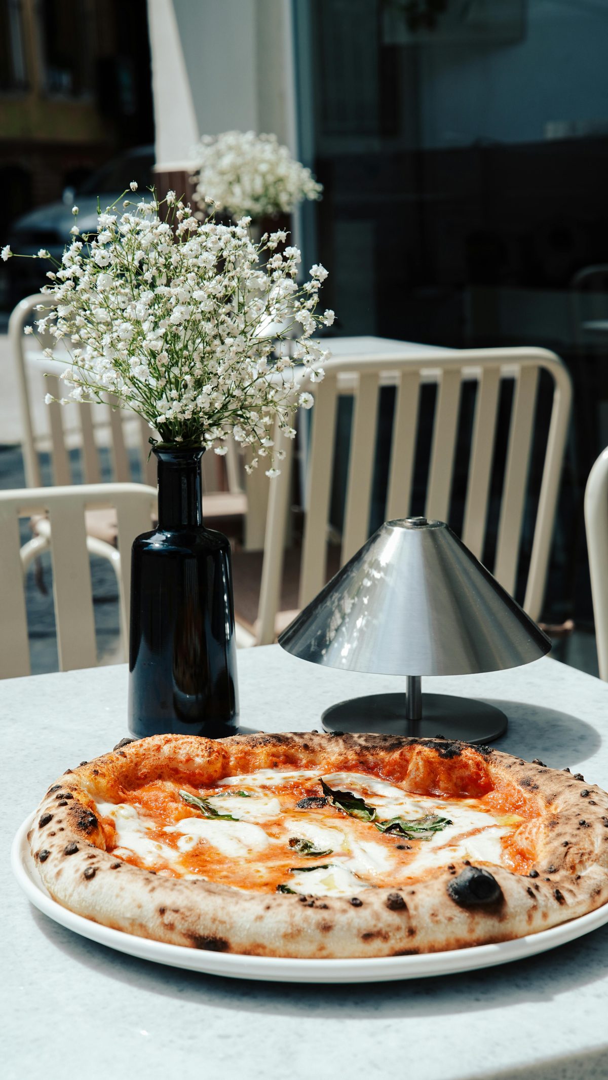 Wood-fired pizza oven in a UK garden setting